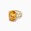 A gold and silver ring with an ornate